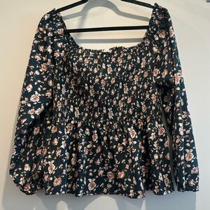 Boutique Smocked long sleeve floral top. Size Large! Never worn